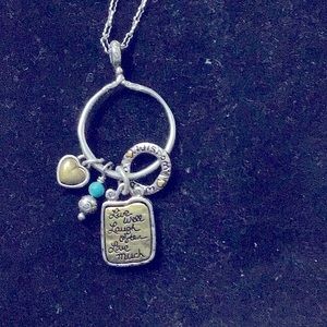 Brighton charm and heart mid length silver and antique bronze necklace.